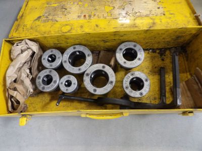 a yellow box with a bunch of tools inside of it