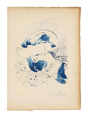 un vieux livre sur lequel figure le dessin d'une femme assise sur une chaise