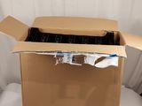 a cardboard box with a toothbrush inside of it
