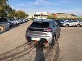 many cars parked in a parking lot in a parking lot