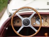 a close up of a steering wheel and dashboard of a car