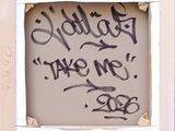 a picture of a picture of someone writing on the wall