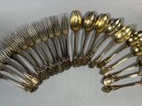 a lot of spoons and forks arranged in a circle