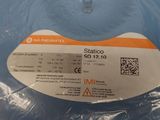 a picture of a blue plastic bag with a sticker on it