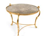 an image of a gold coffee table with a marble top