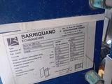 a sign on the side of a blue container