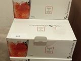 three boxes stacked on top of each other in a room