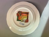 a plate with a picture on it on a table