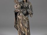 an image of a statue of a woman holding a child