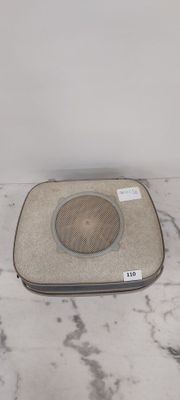 a laptop computer case sitting on a marble surface