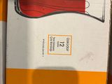 a box that has a pair of scissors in it