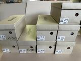 several boxes are stacked on top of each other on a table