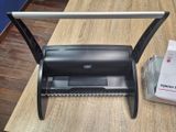 an image of a desk with a laptop and a printer on it