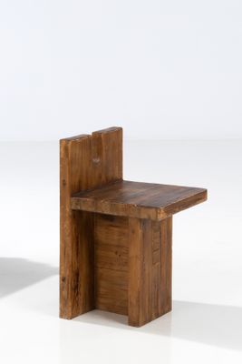 two wooden tables with one sitting on top of it