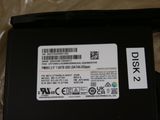 a picture of a hard drive with a sticker on it