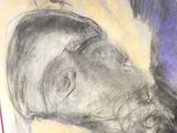 dessin représentant le visage d'un homme avec une cigarette à la bouche