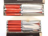 three different types of knives are in a box on a white surface