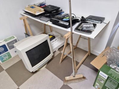an image of a room with a computer and other electronics