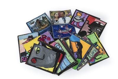 a pile of cards that have pictures of people on them