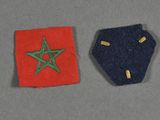 two patches with a star on them on a table