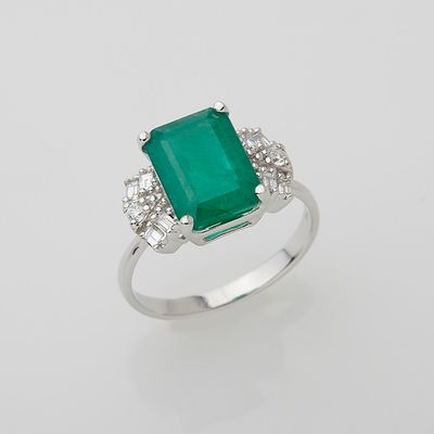 an emerald and diamond ring