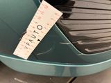 a sticker on the front of a car that says auto today