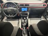 the interior of a car with a steering wheel, dashboard, and dash board