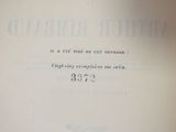 an old book with a black and white image on it
