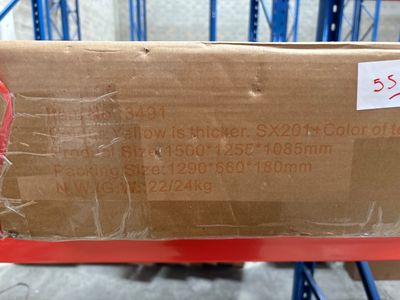 a cardboard box on a pallet in a warehouse