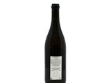 a bottle of wine that is sitting on a table