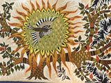 un tableau représentant un arbre et un oiseau accroché au mur