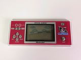 an image of a red gameboy sitting on top of a white table