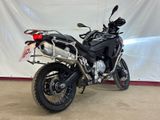 a motorcycle that is parked in a garage
