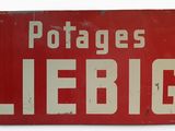 a red sign that says potatoes liebig on it