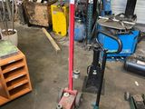 a picture of a garage filled with tools and equipment