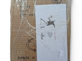a cardboard box with a picture of a man on it