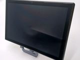 an image of a monitor on a stand on a white surface