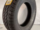 a close up of a tire on a white surface