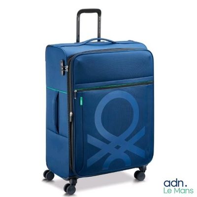 une image représentant un bagage orné d'un motif bleu