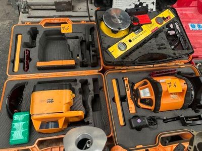 many tools that are sitting in a case on the ground
