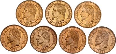 a set of six gold sovereigns of different sizes and shapes
