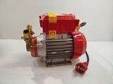 a red and yellow lego engine with a red valve