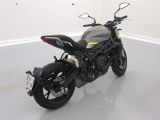 a picture of a motorcycle parked in a white room