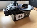 a keyboard and a mouse sitting on a desk next to a monitor