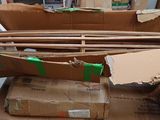 a pile of cardboard boxes sitting on a table