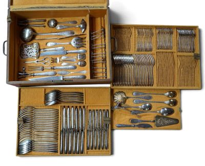 many different types of silverware in a wooden box