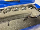a blue tool box with a wrenet and a wrenet inside of it