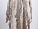 an image of a white shirt hanging on a hanger