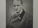an old black and white photo of a man with a bow tie