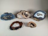 several different types of agate on a white surface